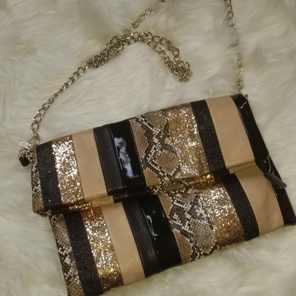 Animal/snakeskin fold clutch